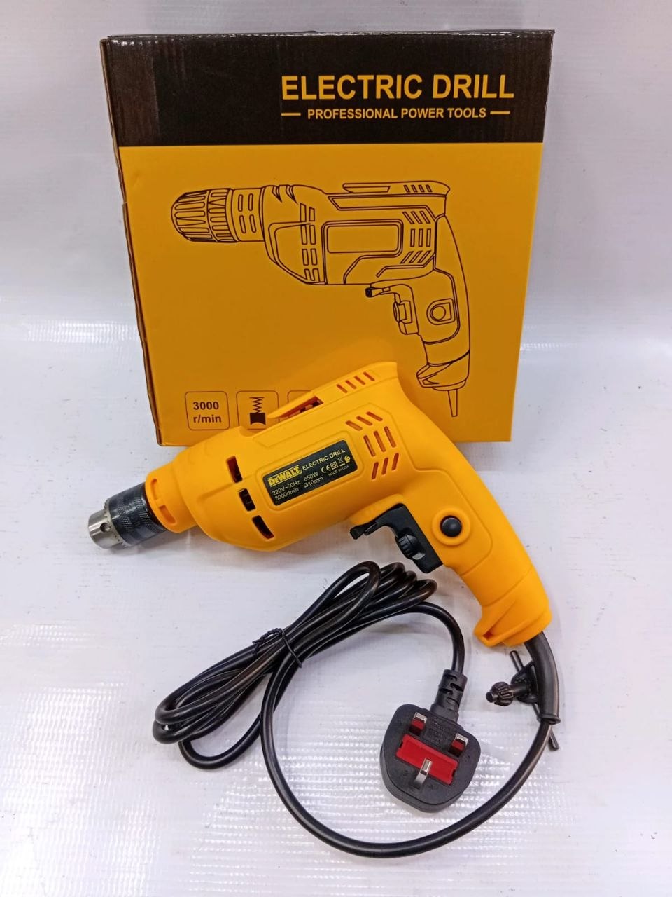 2e47c0a3-c556-4ad1-b7d1-c2541b8bcc6d (1) Dewalt Corded Electric Drill 650W 10mm - Image 1